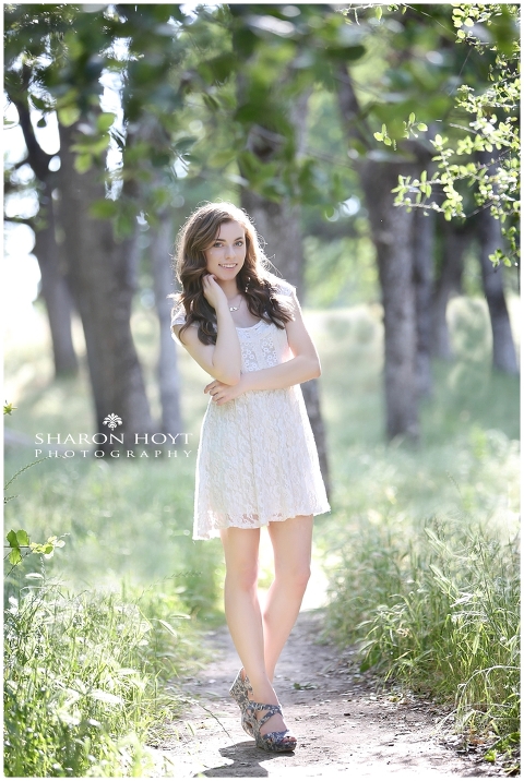high school senior girl in white dress