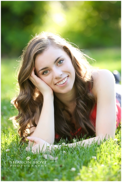 high school senior girl in grass